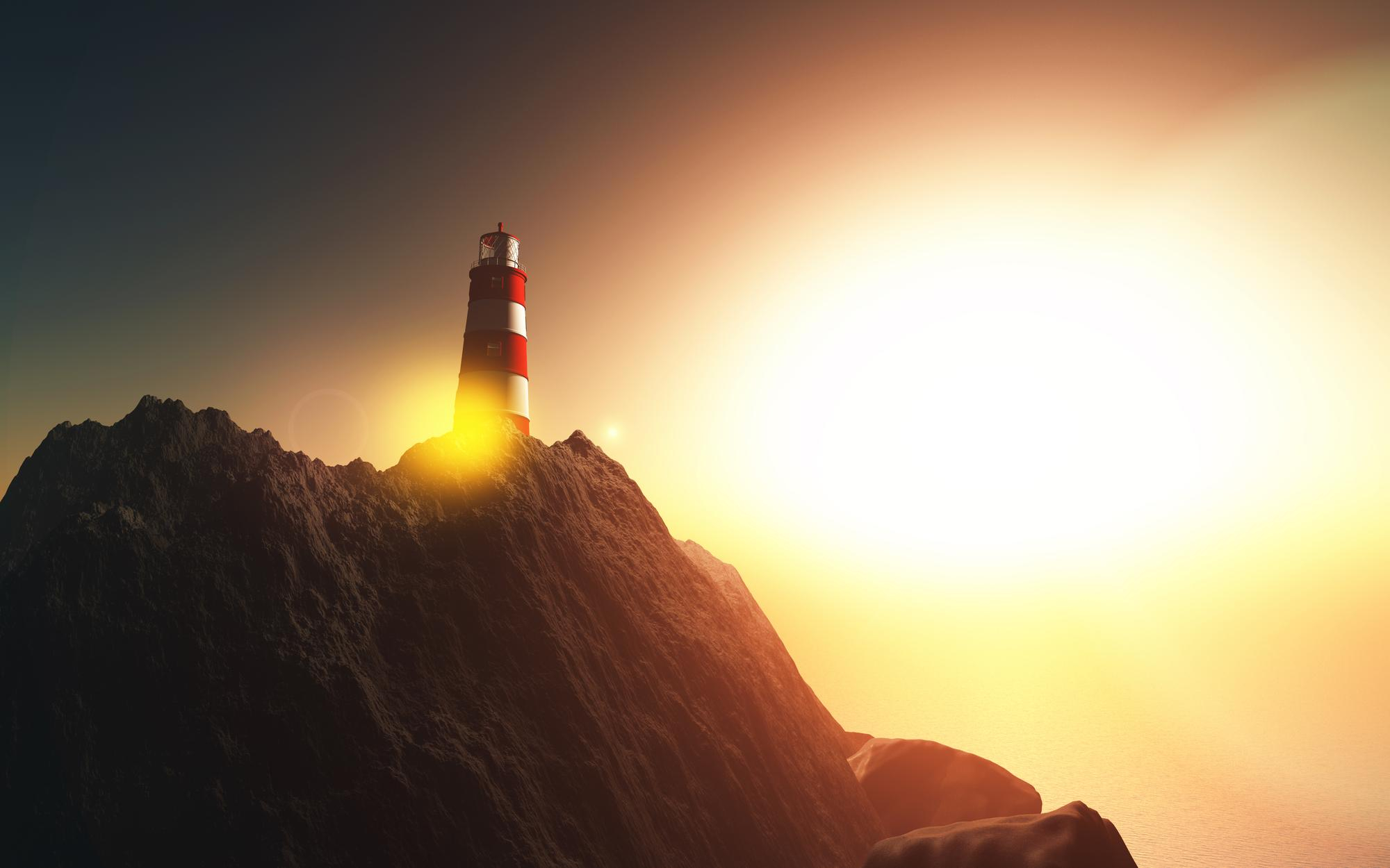 A lighthouse on a hill against a sunset landscape.